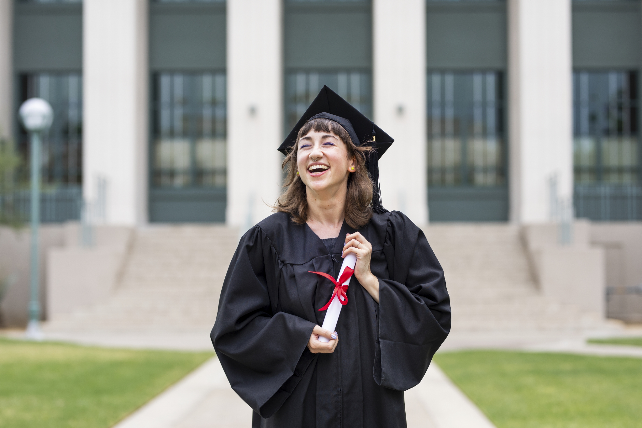 short hair female graduated